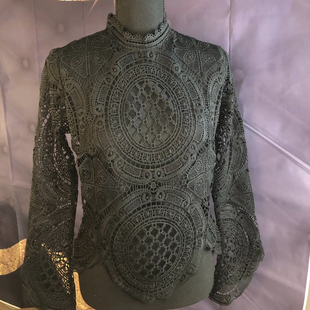 Black lace bell sleeve blouse.